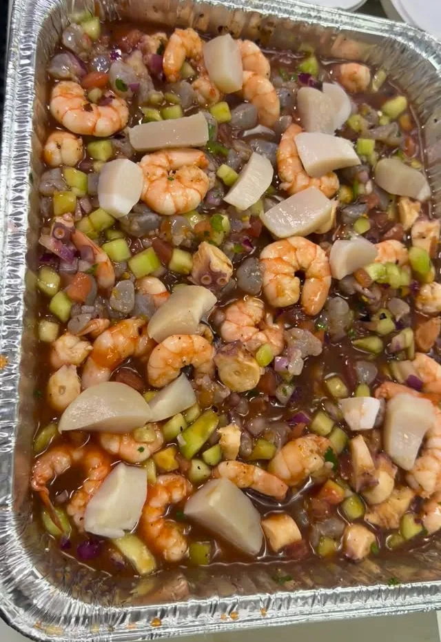 A foil charola of aguachile with shrimp, cucumber and red onion, off El Machiwi's own Instagram
